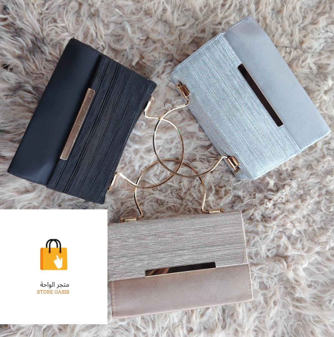 شنطة يد سواريه