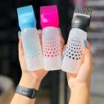 موزع زيت الشعر